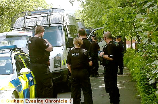 BOMB squad . . . the explosive device team before they seized the grenades in Onchan Avenue, Glodwick. 