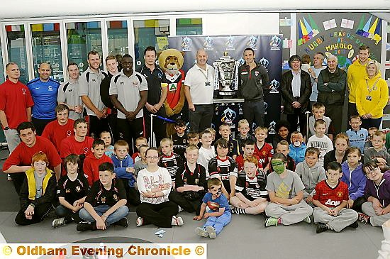 ON show . . . The Rugby League World Cup at Mahdlo, with England’s Kevin Sinfield, along with Terry Flanagan, Roughyeds players and youngsters 
