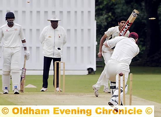 OUT YOU GO: Crompton batsman Darren Graham is beaten all ends up by a swinging delivery from Humza Naeen during Sunday’s Wood Cup tie at Heywood. OUT YOU GO: Crompton batsman Darren Graham is beaten all ends up by a swinging delivery from Humza Naeen during Sunday’s Wood Cup tie at Heywood.