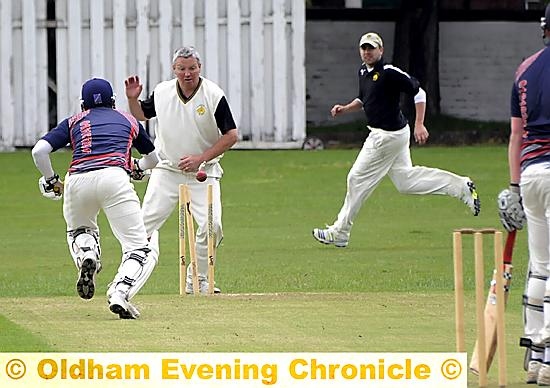 CRASH OF ASH . . . Werneth batsman Ali Muzzaffer is unable to make his ground in the Twenty20 clash against Milnrow. CRASH OF ASH . . . Werneth batsman Ali Muzzaffer is unable to make his ground in the Twenty20 clash against Milnrow.