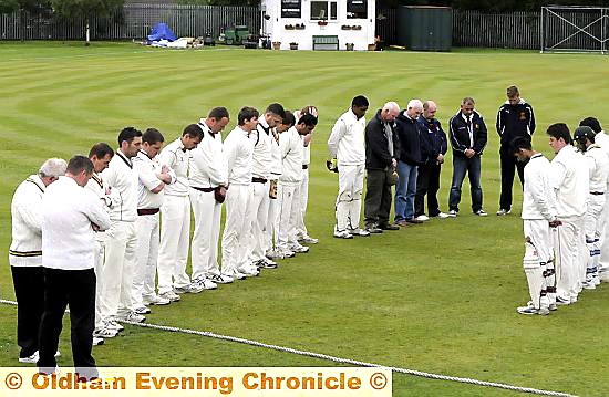 PLAYERS and officials pay their respects before yesterday’s game between Crompton and Oldham.