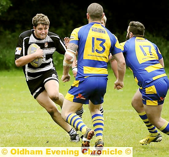 SIDE STEP: Saddleworth Rangers forward Jack Connor takes on the Oulton defence. SIDE STEP: Saddleworth Rangers forward Jack Connor takes on the Oulton defence.