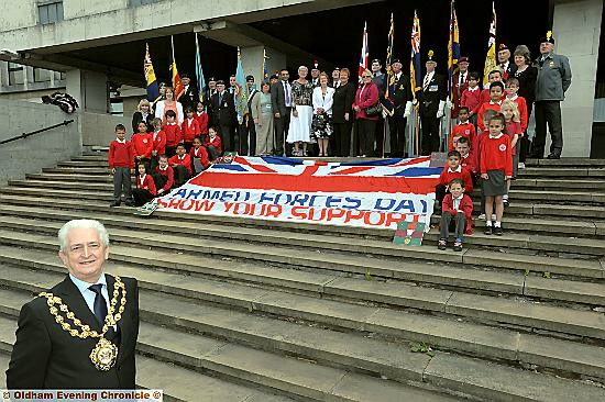 RESPECT: Oldham Mayor, Councillor John Hudson, with youngsters from Medlock Valley Primary, standard bearers from the Ex-Service Liaison Organisations, and councillors RESPECT: Oldham Mayor, Councillor John Hudson, with youngsters from Medlock Valley Primary, standard bearers from the Ex-Service Liaison Organisations, and councillors