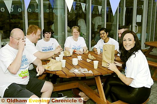 MEMBERS of the Halifax team take a break from preparing and serving food to have their own Big Lunch. View more images on our “buy a photo” tab above
MEMBERS of the Halifax team take a break from preparing and serving food to have their own Big Lunch. View more images on our “buy a photo” tab above