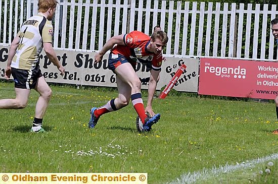 TRY TIME: Jon Ford touches down for the third of Oldham’s five tries in a hard-fought win over the London outfit. 