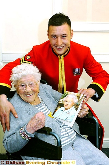 SPECIAL delivery . . . Kyle hands his great-gran Amy her card from the Queen
SPECIAL delivery . . . Kyle hands his great-gran Amy her card from the Queen