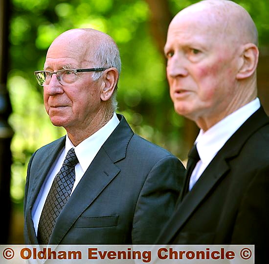 SIR Bobby Charlton with ex Oldham Athletic chairman Barry Chaytow  


