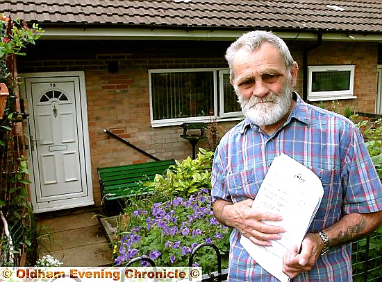 BIG bill: George Brassington at his new Holts home with his bill from FCHO for his DIY work on a previous property
BIG bill: George Brassington at his new Holts home with his bill from FCHO for his DIY work on a previous property