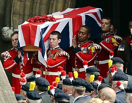 The coffin of murdered Fusilier Lee Rigby is carried from Bury Parish Church. The coffin of murdered Fusilier Lee Rigby is carried from Bury Parish Church.