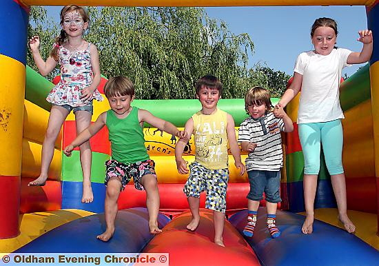 ENJOYING the bouncy castle (from left) Connie Long, Michael O’Connell, Thomas Jones, Harley Fairclough and Lucie Pickersgill 
