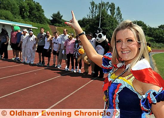 Heather Hunt - that’s not the school unifrm, by the way - starts the race 
