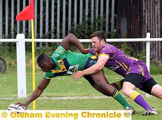 MO Agoro scores Oldham’s eighth try. 