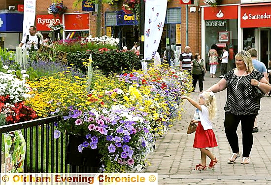 Petal power . . . the town centre was awash with colourful flowers 