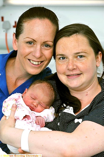 BABY joy: mum Sarah Wardhaugh with baby Grace and midwife Lisa Crossley Oldham-born baby shares big day with new prince. BABY joy: mum Sarah Wardhaugh with baby Grace and midwife Lisa Crossley Oldham-born baby shares big day with new prince.