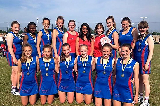 ALL SMILES . . . Oldham Netball Club under-15s. 
