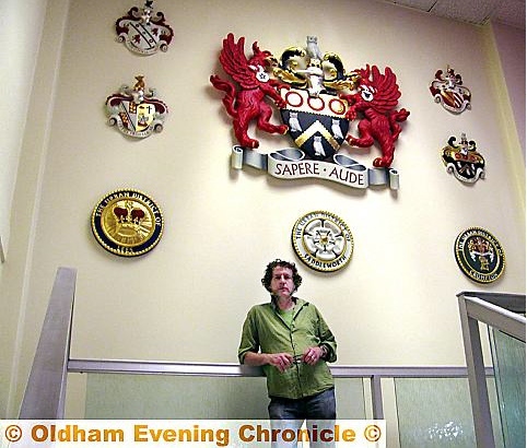 OLDHAM by name: Charlie Oldham with the crest, which is now up in the Civic Centre
OLDHAM by name: Charlie Oldham with the crest, which is now up in the Civic Centre