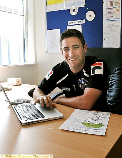 FINGER ON THE PULSE: Lee Johnson in his office at Boundary Park. FINGER ON THE PULSE: Lee Johnson in his office at Boundary Park.