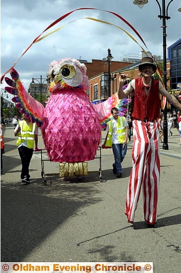 What a hoot: the giant pink owl (above). Caitlin Morrison hitches a ride (right) 