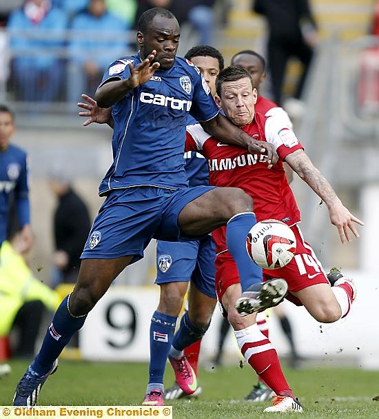 Orient’s Charlie MacDonald (right), a latics target, taking on Jean Yves M'Voto during the League One game in April. Orient’s Charlie MacDonald (right), a latics target, taking on Jean Yves M'Voto during the League One game in April.