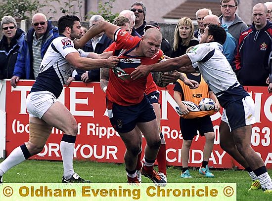 POWER PLAY: Oldham’s star man Josh Crowley makes his presence felt. POWER PLAY: Oldham’s star man Josh Crowley makes his presence felt.