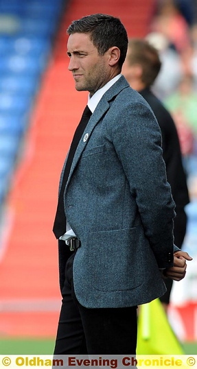 FOOD FOR THOUGHT . . . Athletic boss Lee Johnson looks on. FOOD FOR THOUGHT . . . Athletic boss Lee Johnson looks on.