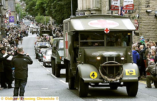 The military vehicle parade passing through Saddleworth 

