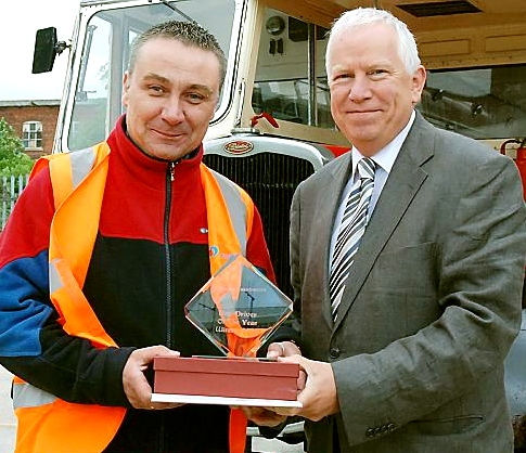 CONGRATULATIONS . . . Jason Gartside (left) is presented with his regional award by Stagecoach Manchester managing director Christopher Bowles
CONGRATULATIONS . . . Jason Gartside (left) is presented with his regional award by Stagecoach Manchester managing director Christopher Bowles