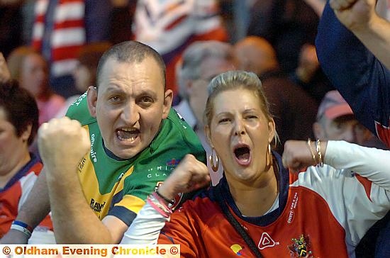 “COME ON OLDHAM” . . . fans get behind their team at Spotland last night.
“COME ON OLDHAM” . . . fans get behind their team at Spotland last night.