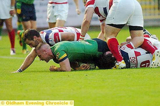 FLAT OUT FOR SUCCESS . . . Danny Langtree scores Oldham’s fourth try against Rochdale in last night’s clash at Spotland.
FLAT OUT FOR SUCCESS . . . Danny Langtree scores Oldham’s fourth try against Rochdale in last night’s clash at Spotland.