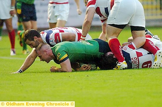 FLAT OUT FOR SUCCESS . . . Danny Langtree scores Oldham’s fourth try against Rochdale in last night’s clash at Spotland. 
