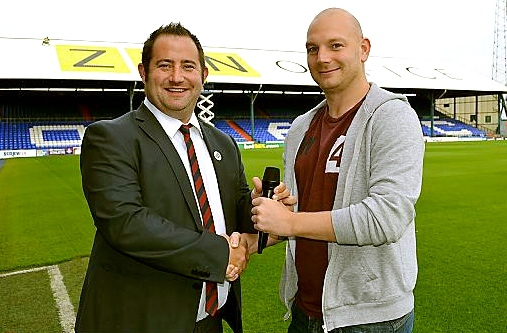 MATCH fit: David Broadbent (left) hands over the microphone to Adam Wilson
MATCH fit: David Broadbent (left) hands over the microphone to Adam Wilson