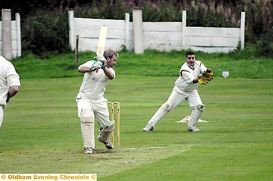 Shaw wicketkeeper Phil Taylor takes the ball as Stayley batsman Steve Bird plays and misses. Shaw wicketkeeper Phil Taylor takes the ball as Stayley batsman Steve Bird plays and misses.