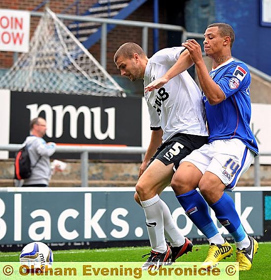 HANDFUL . . . Jonson Clarke-Harris (right) gave Port Vale all sorts of problems at Boundary Park 