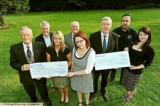 CHARITY boost (from the left) Jim Matthews, president of the Rotary Club of Oldham Metro; show director Gordon Russell, of Saddleworth Rotary Club; Heather Robertson (The Christie) Brian Fort (Oldham Metro), Fiona Ashcroft (The Christie), John Ainley (Saddleworth Rotary Club past president), Michael Griffiths (AWC Home Improvements), and Lisa Pearson (Dr Kershaw’s Hospice) CHARITY boost (from the left) Jim Matthews, president of the Rotary Club of Oldham Metro; show director Gordon Russell, of Saddleworth Rotary Club; Heather Robertson (The Christie) Brian Fort (Oldham Metro), Fiona Ashcroft (The Christie), John Ainley (Saddleworth Rotary Club past president), Michael Griffiths (AWC Home Improvements), and Lisa Pearson (Dr Kershaw’s Hospice)