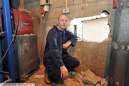 WAY in . . . Framos worker Paul Hughes where thieves broke in 
