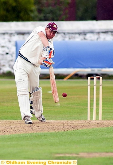 BOUNDARY BID: Uppermill’s Nathan Boote is in full flow. BOUNDARY BID: Uppermill’s Nathan Boote is in full flow.