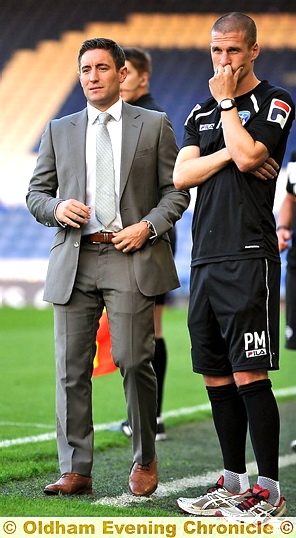 FOOD FOR THOUGHT . . . manager Lee Johnson and first-team coach Paul Murray look on as Athletic strive to find a way through the Derby County back line.
FOOD FOR THOUGHT . . . manager Lee Johnson and first-team coach Paul Murray look on as Athletic strive to find a way through the Derby County back line.