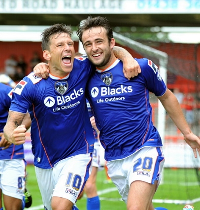 plenty to smile about . . . Charlie MacDonald (left) and Jose Baxter show their delight at Stevenage on the opening day of the Sky Bet League One season. plenty to smile about . . . Charlie MacDonald (left) and Jose Baxter show their delight at Stevenage on the opening day of the Sky Bet League One season.