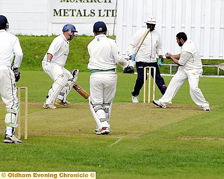 Mohammed Zaman Khan: Werneth’s professional (right) hit 221 not out against Oldham last weekend 