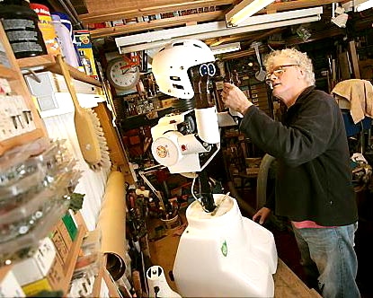 Recycler the robot, with David Buckley, his creator at his workshop 

