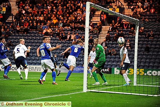 LIFELIFE . . . James Tarkowski (right) wheels away in delight after pulling a late goal back for Athletic at Deepdale last night. 