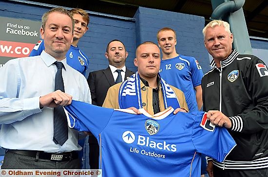 SIGNED (back, from the left): James Tarkowski (defender), David Broadbent (Oldham Athletic sales and marketing executive), David Mellor (midfielder), (front, from the left) Neil Joy (Oldham Athletic chief executive), Ben Ingham (Safeguard Group) and Tony Philliskirk (Oldham Athletic head of youth development) 
