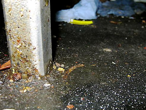 DISGUSTING: grease and debris build-up around equipment feet 