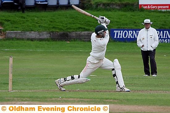 Adam Good hits out for Royton. 
