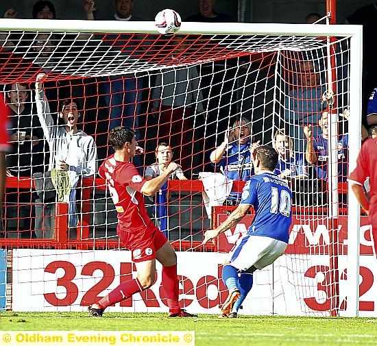 WHAT A WASTE: Charlie Macdonald hits the crossbar from point-blank range. 