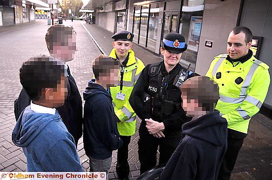 CADET Matthew Haughton, PCSO Suzanne Hudson and Fire and Rescue Volunteer Simon Mallitt chat to local youngsters.