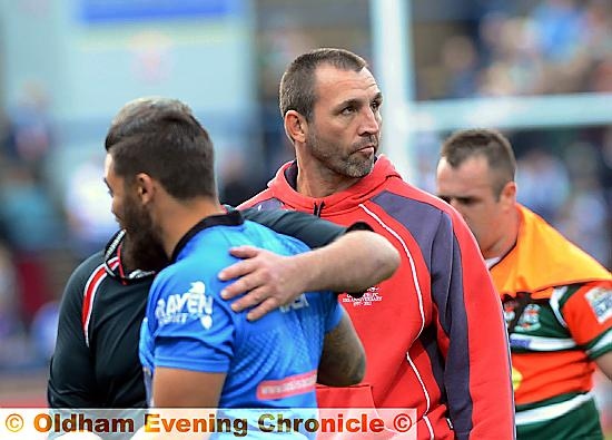 GO ONE BETTER: Oldham coach Scott Naylor (centre) is aiming for promotion.