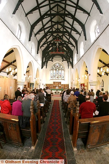 A FULL congregation for yesterday’s first service, and, right, Archdeacon of Rochdale, Cherry Vann and Father Nick Smeeton