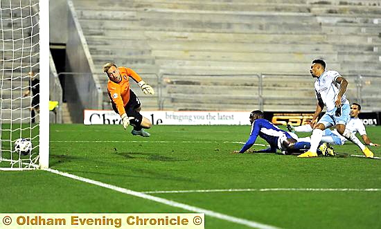 OFF THE MARK: Jabo Ibehre stoops to conquer as he heads home his first goal for Athletic. 