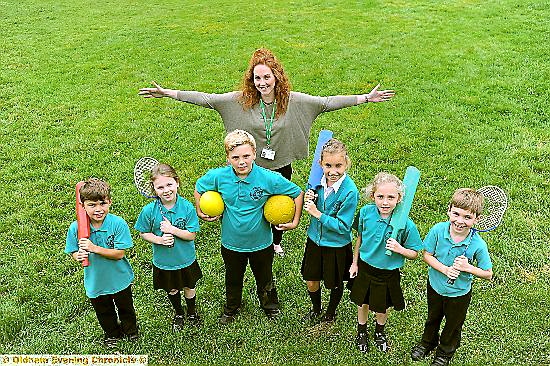 CELEBRATIONS: pupils, from left, Oliver Bentley, Phoebe Elgin, Sebastian Eastwood, Phoebie Skidmore, Sadie Bardsley and Thomas Frankovitch with PE co-ordinator Fay Wilson CELEBRATIONS: pupils, from left, Oliver Bentley, Phoebe Elgin, Sebastian Eastwood, Phoebie Skidmore, Sadie Bardsley and Thomas Frankovitch with PE co-ordinator Fay Wilson